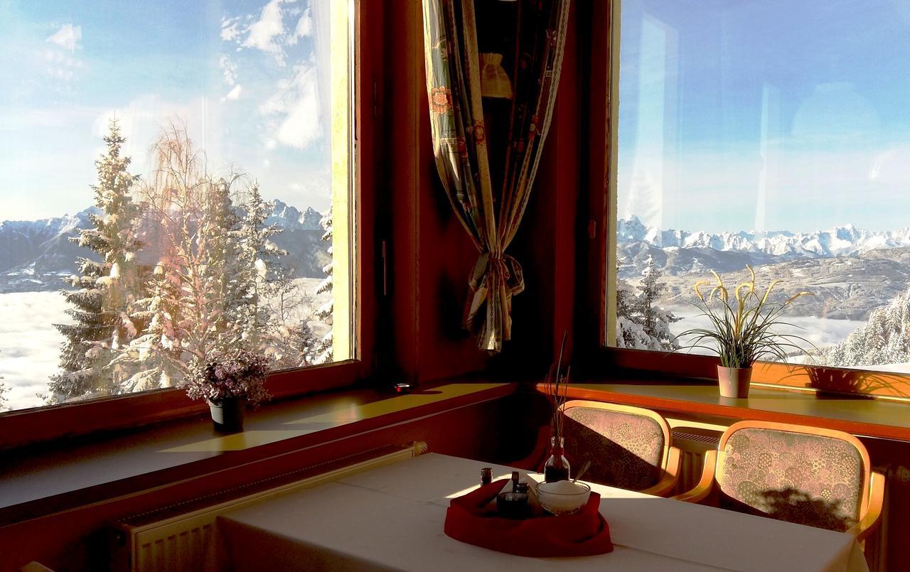 Hotel Alpinum Треффен Экстерьер фото