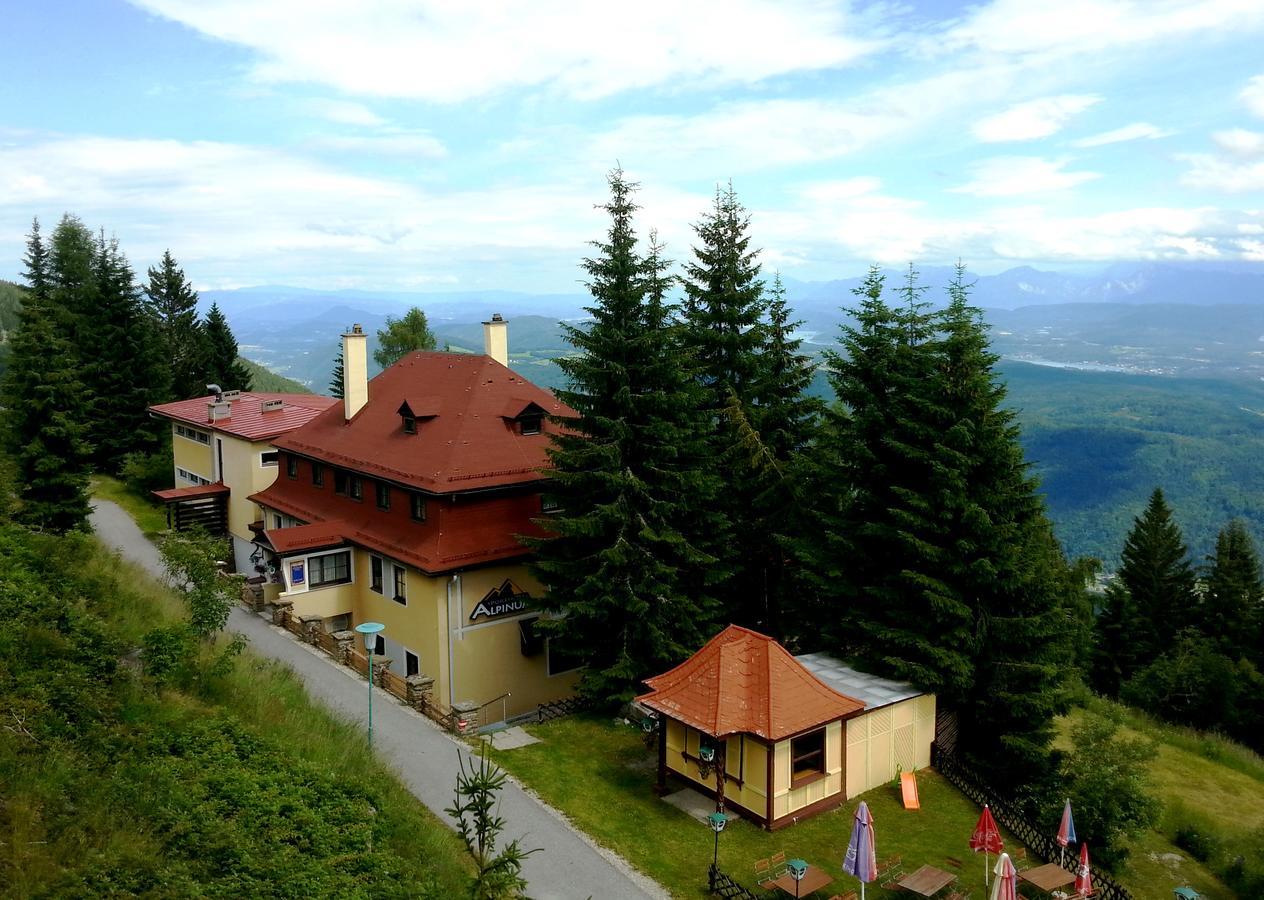 Hotel Alpinum Треффен Экстерьер фото
