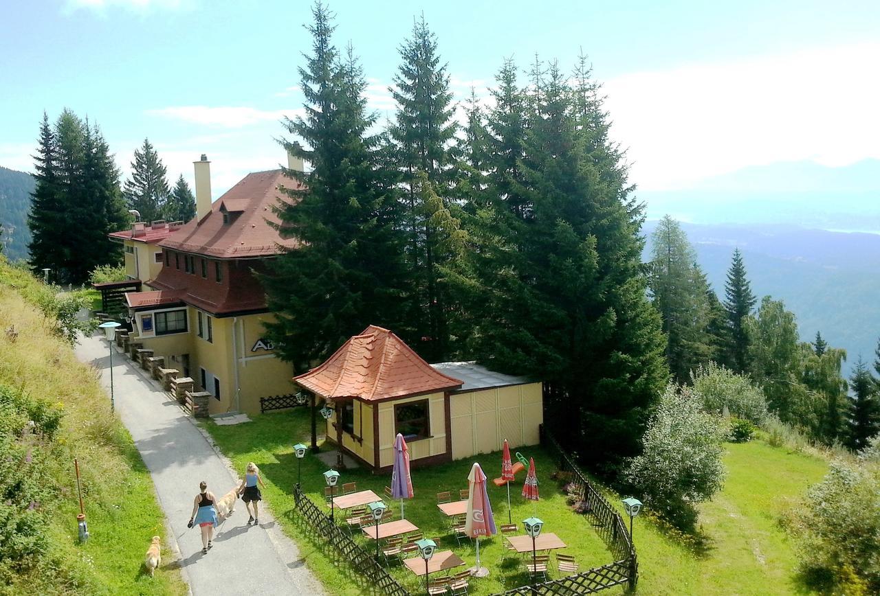Hotel Alpinum Треффен Экстерьер фото
